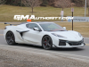 2023-chevrolet-corvette-c8-z06-coupe-arctic-white-first-on-road-photos-outboard-exhaust-april-2022-exterior-004