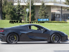 2023-chevrolet-corvette-z06-coupe-black-exterior-black-spider-wheels-yellow-brake-calipers-black-badging-008-outboard-exhaust