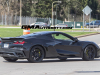 2023-chevrolet-corvette-z06-coupe-black-exterior-black-spider-wheels-yellow-brake-calipers-black-badging-010-outboard-exhaust