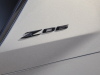 2023-chevrolet-corvette-z06-coupe-silver-flare-metallic-exterior-004-z06-logo-in-carbon-flash-on-rear-quarter-panel