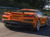 2023-chevrolet-corvette-z06-coupe-with-z07-performance-package-amplify-orange-tintcoat-exterior-006-rear-three-quarters-carbon-fiber-high-wing-spoiler
