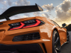 2023-chevrolet-corvette-z06-coupe-with-z07-performance-package-amplify-orange-tintcoat-exterior-010-tail-light-carbon-fiber-high-wing-spoiler