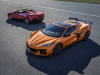 2023-chevrolet-corvette-z06-red-mist-metallic-convertible-on-left-amplify-orange-tintcoat-coupe-with-z07-package-on-right-exterior-001