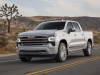2022-chevrolet-silverado-1500-high-country-iridescent-pearl-tricoat-g1w-press-photos-exterior-002-side-front-three-quarters