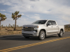 2022-chevrolet-silverado-1500-high-country-iridescent-pearl-tricoat-g1w-press-photos-exterior-004-side-front-three-quarters