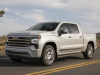 2022-chevrolet-silverado-1500-high-country-iridescent-pearl-tricoat-g1w-press-photos-exterior-005-side-front-three-quarters