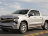 2022-chevrolet-silverado-1500-high-country-iridescent-pearl-tricoat-g1w-press-photos-exterior-006-side-front-three-quarters