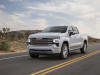 2022-chevrolet-silverado-1500-high-country-iridescent-pearl-tricoat-g1w-press-photos-exterior-014-side-front-three-quarters