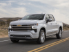 2022-chevrolet-silverado-1500-high-country-iridescent-pearl-tricoat-g1w-press-photos-exterior-015-side-front-three-quarters