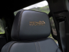 2022-chevrolet-silverado-1500-high-country-press-photos-interior-004-drivers-seat-high-country-script-on-headrest