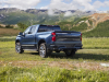 2022-chevrolet-silverado-1500-refresh-high-country-exterior-005-rear-three-quarter-dual-exhaust-tail-lamps-tailgate