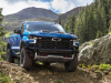 2022-chevrolet-silverado-1500-refresh-zr2-exterior-002-front-grille-chevy-logo-flow-tie-front-bumper-red-tow-hooks