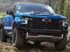 2022-chevrolet-silverado-1500-refresh-zr2-exterior-003-front-grille-chevy-logo-flow-tie-front-bumper-red-tow-hooks