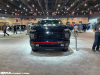 2022-chevy-silverado-3500hd-hoonigan-concept-2021-sema-exterior-001-front-chrome-grille-painted-black-black-chevy-bow-tie-logo-tow-hooks-fog-lights