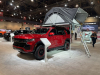 2022-chevrolet-tahoe-z71-overlanding-concept-2021-sema-live-photos-exterior-001-front-three-quarters-freespirit-recreation-high-country-80-inch-premium-tent-and-latter