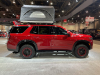 2022-chevrolet-tahoe-z71-overlanding-concept-2021-sema-live-photos-exterior-008-side-freespirit-recreation-high-country-80-inch-premium-tent-18-inch-beadlock-wheels-33-inch-bf-goodrich-od-mud-terrain