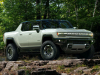 2022-gmc-hummer-ev-pickup-edition-1-exterior-011-front-three-quarters-forest