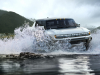 2022-gmc-hummer-ev-pickup-edition-1-exterior-018-front-three-quarters-driving-through-water