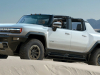 2022-gmc-hummer-ev-pickup-edition-1-exterior-025-front-three-quarters-sand-dunes