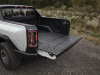 2022-gmc-hummer-ev-pickup-edition-1-exterior-073-rear-three-quarters-multipro-tailgate-open-position