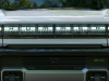 2022-gmc-hummer-ev-pickup-edition-1-exterior-084-hummer-logo-on-back-lit-grille-gmc-logo
