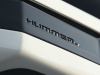2022-gmc-hummer-ev-pickup-edition-1-exterior-090-hummer-logo-script-on-outsall-mirror