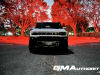2022-gmc-hummer-ev-pickup-edition-1-gma-garage-exterior-at-night-005-front-tail-lights-and-parking-lights-enabled