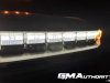 2022-gmc-hummer-ev-pickup-edition-1-gma-garage-exterior-at-night-008-drl-daytime-running-light-bar-with-hummer-logo-side-marker-light