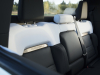 2022-gmc-hummer-ev-pickup-edition-1-interior-019-rear-seat-backs-hummer-ev-logo