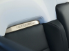 2022-gmc-hummer-ev-pickup-edition-1-interior-020-rear-seat-backs-hummer-ev-logo
