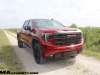 2022-gmc-sierra-1500-at4x-cayenne-red-tintcoat-gma-garage-may-2022-exterior-off-road-001-front-three-quarters
