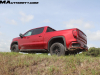 2022-gmc-sierra-1500-at4x-cayenne-red-tintcoat-gma-garage-may-2022-exterior-off-road-017-side-rear-three-quarters