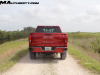 2022-gmc-sierra-1500-at4x-cayenne-red-tintcoat-gma-garage-may-2022-exterior-off-road-026-rear