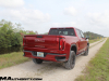 2022-gmc-sierra-1500-at4x-cayenne-red-tintcoat-gma-garage-may-2022-exterior-off-road-029-rear-three-quarters