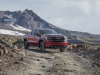 2022-gmc-sierra-1500-at4x-cayenne-red-tintcoat-exterior-002-front-three-quarters