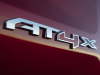 2022-gmc-sierra-1500-at4x-cayenne-red-tintcoat-exterior-008-at4x-logo-badge