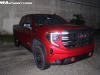 2022-gmc-sierra-1500-at4x-cayenne-red-tintcoat-gma-garage-may-2022-exterior-001-front-three-quarters-gmc-logo-grille-red-tow-recovery-hooks