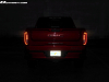 2022-gmc-sierra-1500-at4x-cayenne-red-tintcoat-gma-garage-may-2022-exterior-009-rear-tail-lights-on