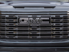 2022-gmc-sierra-1500-denali-ultimate-exterior-014-titanium-rush-front-grille-gmc-logo-badge