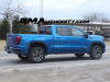 2022-gmc-sierra-at4-1500-dynamic-blue-metallic-crew-cab-first-on-road-pictures-april-2022-exterior-008