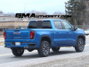 2022-gmc-sierra-at4-1500-dynamic-blue-metallic-crew-cab-first-on-road-pictures-april-2022-exterior-010