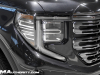 2022-gmc-sierra-denali-ultimate-1500-titanium-rush-metallic-2022-cas-exterior-054-passenger-side-headlight