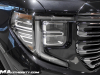 2022-gmc-sierra-denali-ultimate-1500-titanium-rush-metallic-2022-cas-exterior-055-passenger-side-headlight