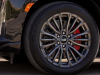2023-cadillac-escalade-v-middle-east-introduction-exterior-008-bridgestone-dueler-tire-22-inch-18-spoke-alloy-wheel-with-after-midnight-finish-and-laser-etching-smm-red-brake-caliper