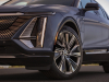 2023-cadillac-lyriq-press-photos-media-drive-exterior-016-stationary-front-vertical-headlights-grille-front-wheel-amber-marker-light