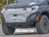 2023-chevrolet-colorado-zr2-prototype-spy-shots-november-2021-exterior-002-front-fascia-with-red-tow-recovery-hooks