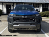 2023-chevrolet-colorado-trail-boss-glacier-blue-metallic-glt-first-drive-exterior-003-front-front-fascia-headlights-black-chevy-bowtie-on-grille