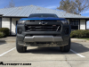 2023-chevrolet-colorado-trail-boss-glacier-blue-metallic-glt-first-drive-exterior-004-front-front-fascia-headlights-black-chevy-bowtie-on-grille