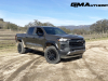 2023-chevrolet-colorado-trail-boss-harvest-bronze-metallic-gxn-first-drive-exterior-008-side-front-three-quarters