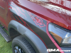 2023-chevrolet-colorado-trail-boss-radiant-red-tintcoat-gnt-first-drive-exterior-030-front-fender-decal